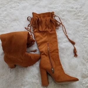 Sandy brown knee high boots